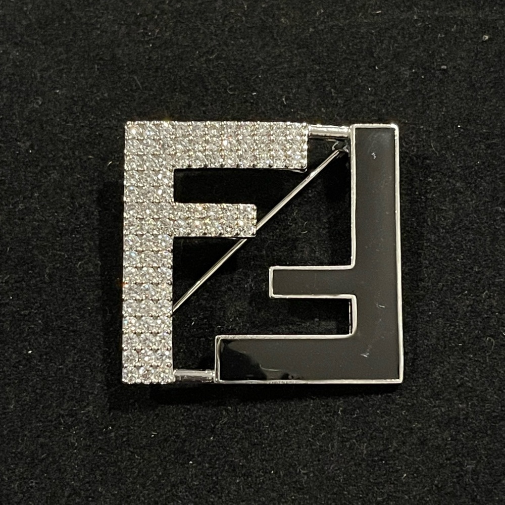 Fashion Jewelry Stamped Black & Silver Logo Brooch